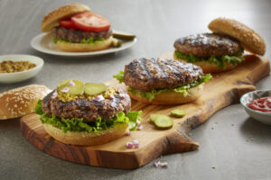 beef burgers on a platter